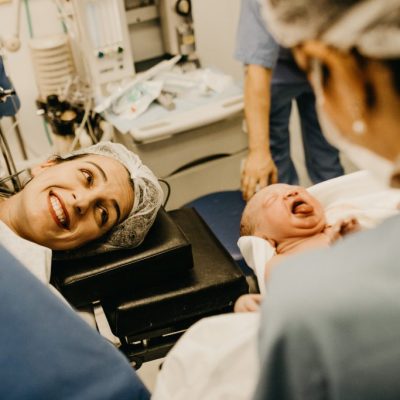 mother-smiling-looking-at-newborn-child-3279203-1024x683